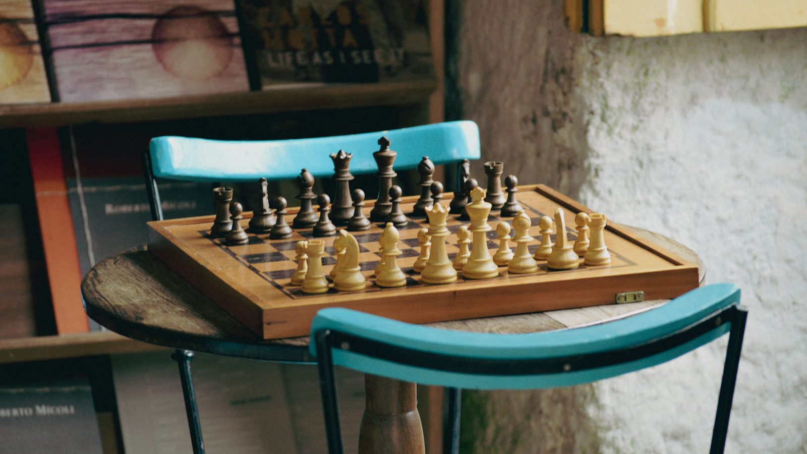 A chess board set up for play, the cover image for an article on spaced repetition and the Woodpecker Method.